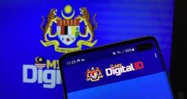 Malaysia triển khai hệ thống ID số sinh trắc học - Máy in thẻ nhựa, máy dập nổi, đầu đọc thẻ nhựa